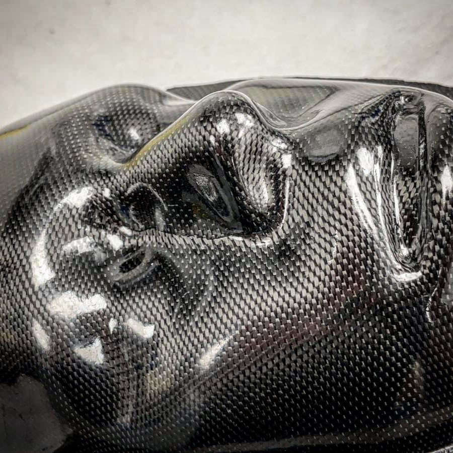 Carbon fibre face
